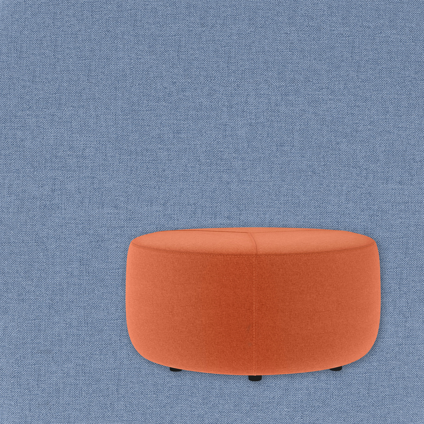 An image of an orange fabric pouf overlayed on a blue fabric textured background